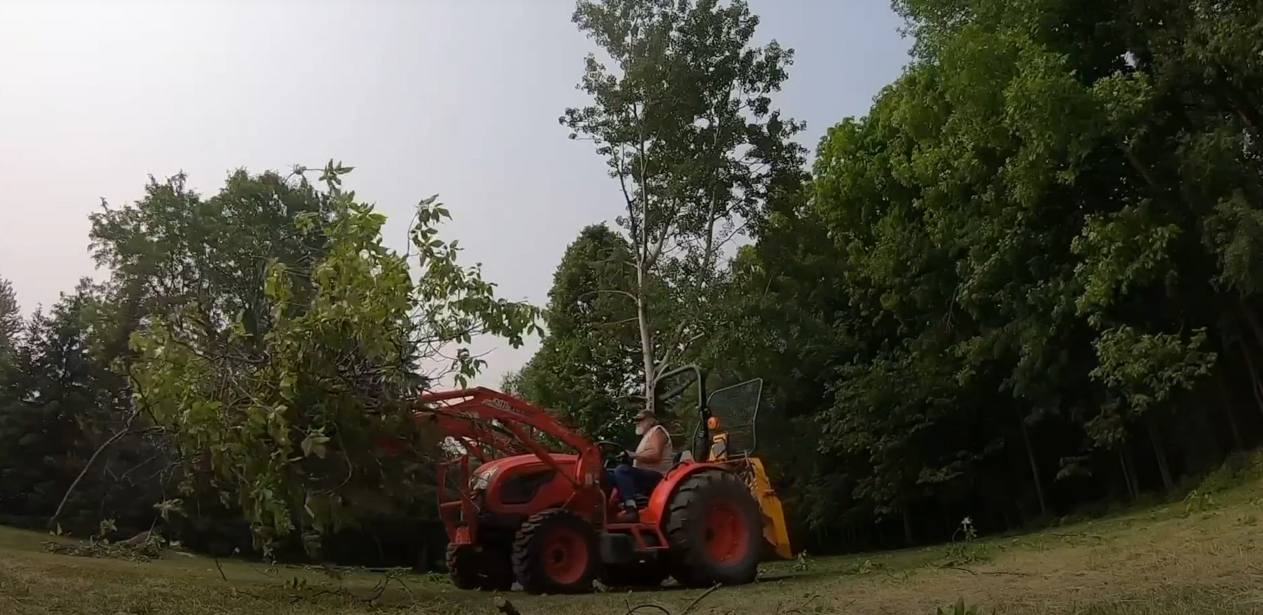 Land clearing equipment preparing lot for construction in Port Arthur, TX